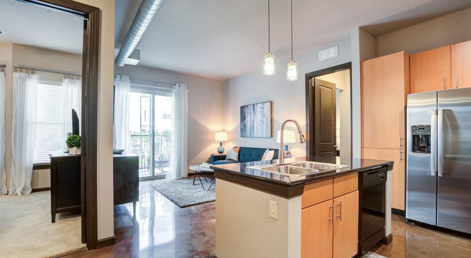 Spacious and well-lit living spaces a kitchen with a large island