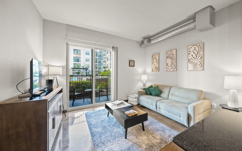 Spacious Living Room with Exposed Duct